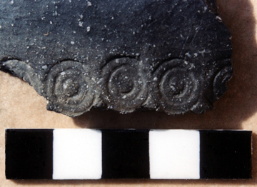 Ring-stamped sherd from a Middle Bronze Age enclosure ditch at Margate Football Club