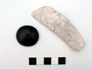 Jet button and flint knife found with the Manston Runway Approach Beaker